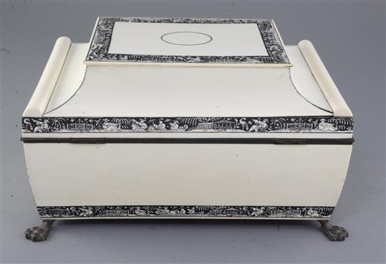 An unusual Vizagapatam ivory and lac-decorated chinoiserie sewing casket, 19th century, width 35cm, some restorations